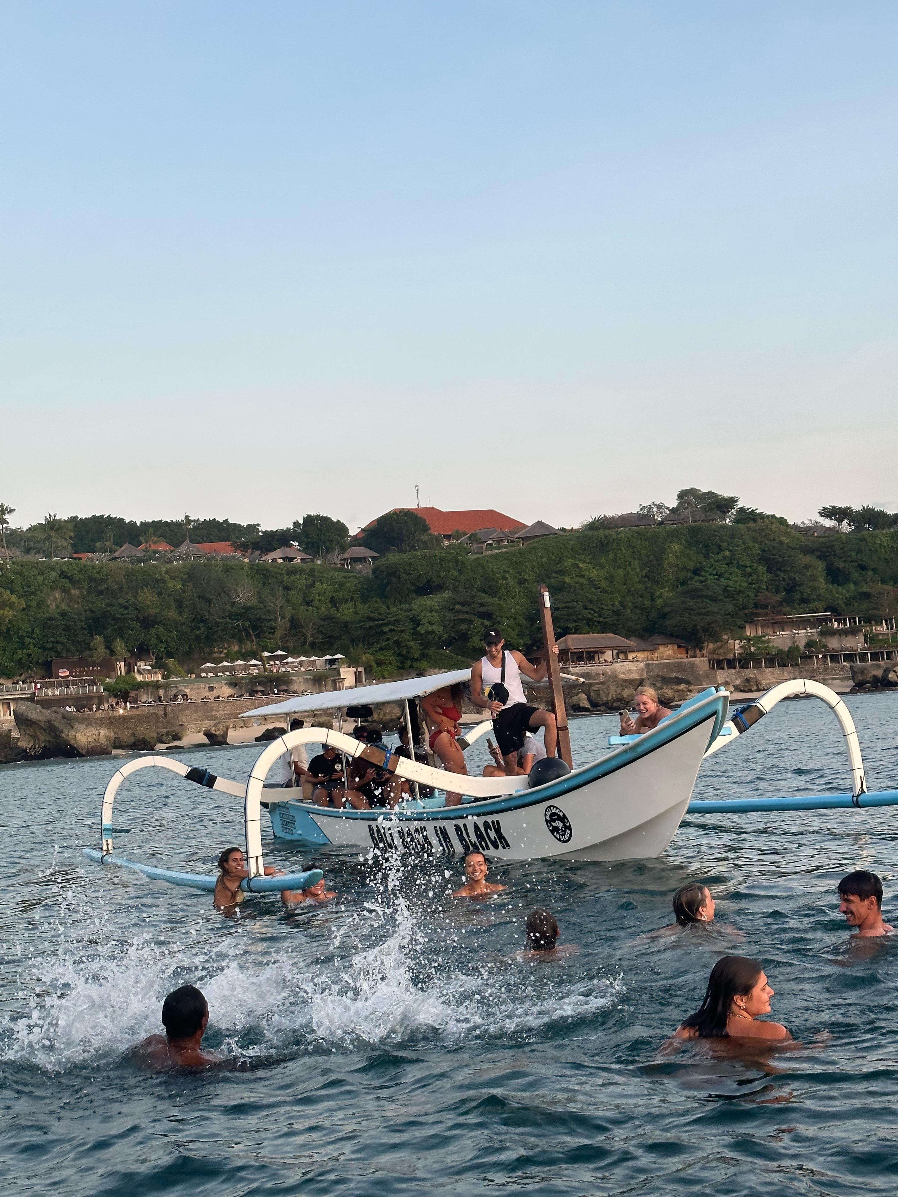 Guests jumping in for a swim stop at Balangan